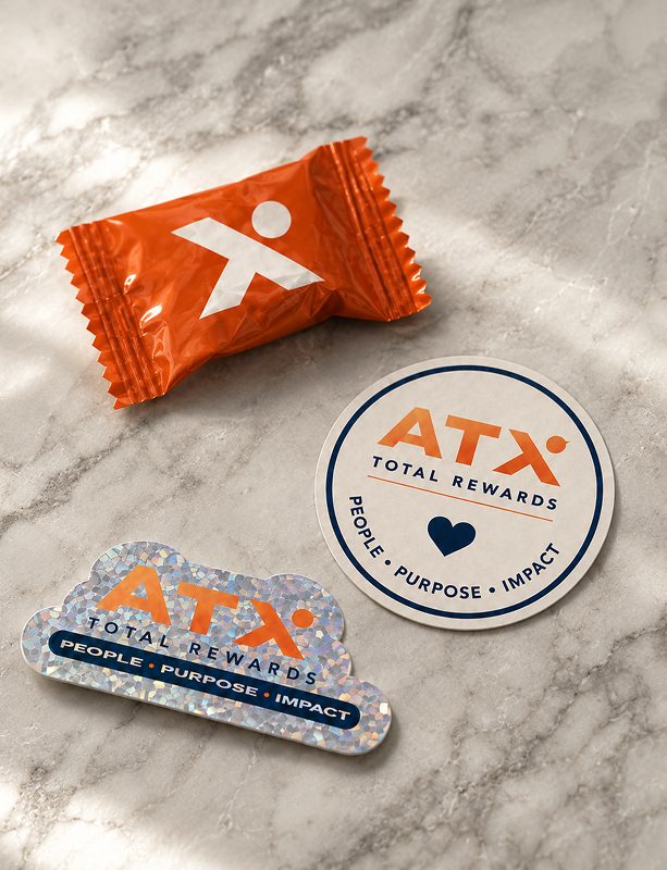 ATX Total Rewards branded stickers and candy